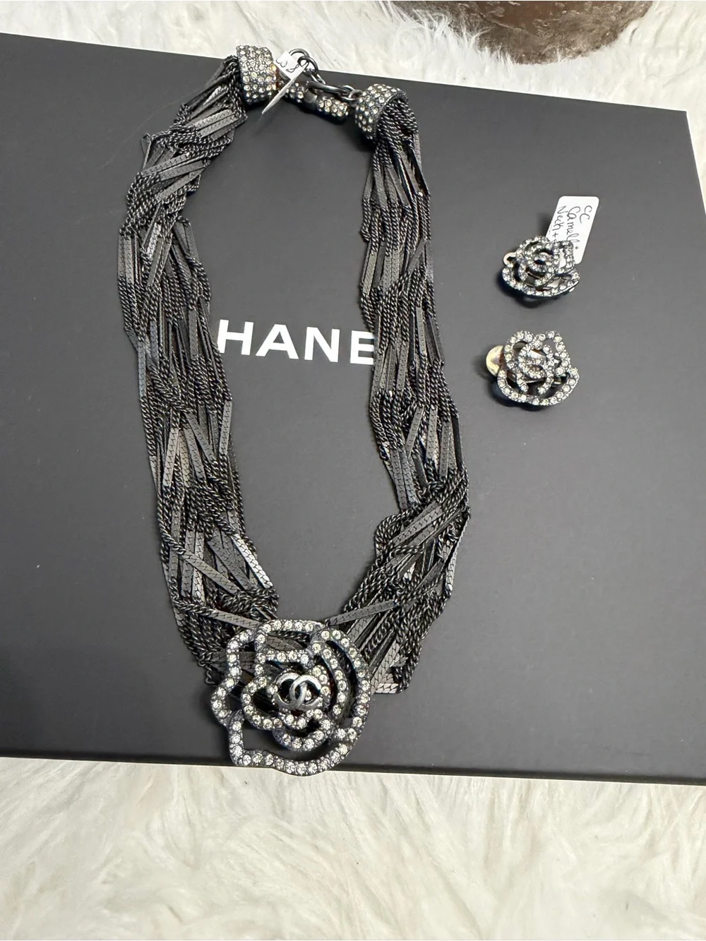 CHANEL Black Multi-Strand Necklace with Crystal Camellia Pendant and Earrings